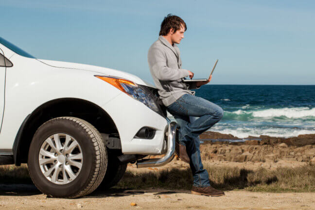 Man comparing cheaper car insurance